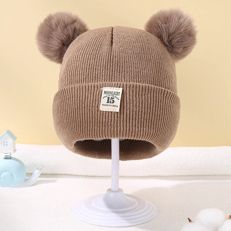 Baby winter hat – knitted beanie with pompom – unisex 