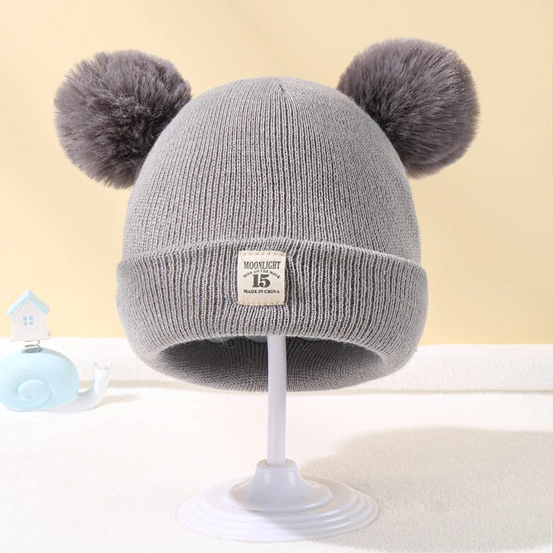 Baby winter hat – knitted beanie with pompom – unisex 