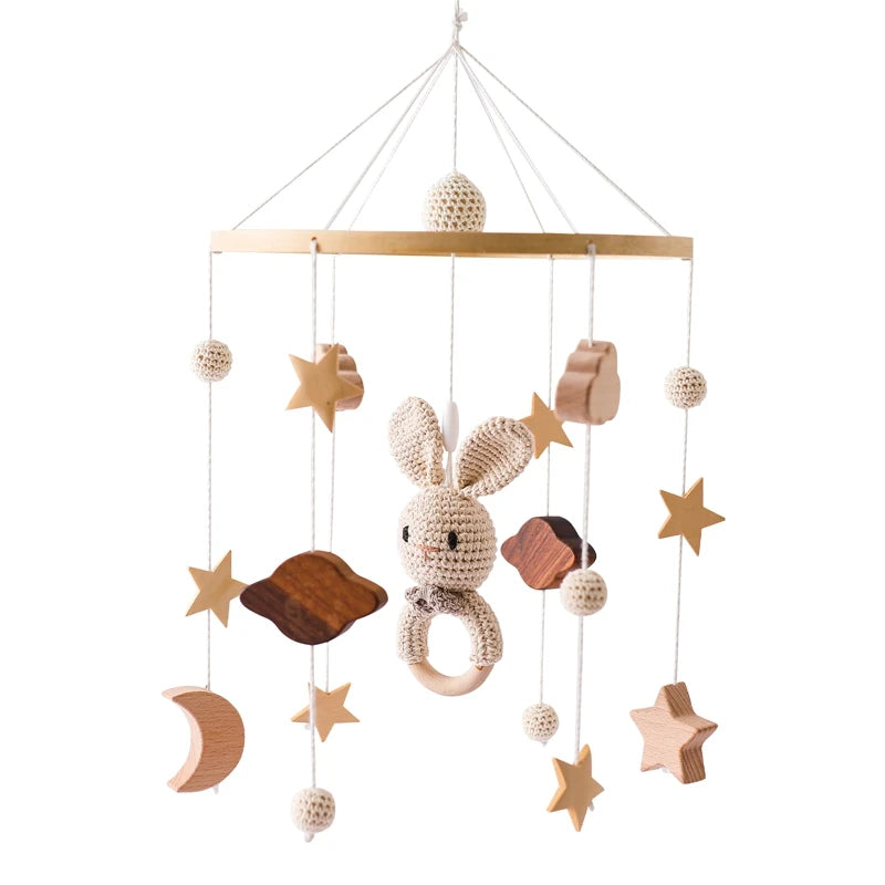 Wooden mobile – with bunnies and playful figures – for a crib or dresser