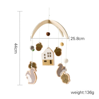Wooden mobile – with bunnies and playful figures – for a crib or dresser
