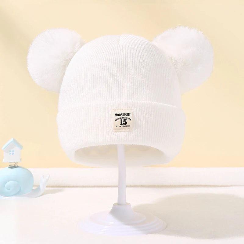 Baby winter hat – knitted beanie with pompom – unisex 