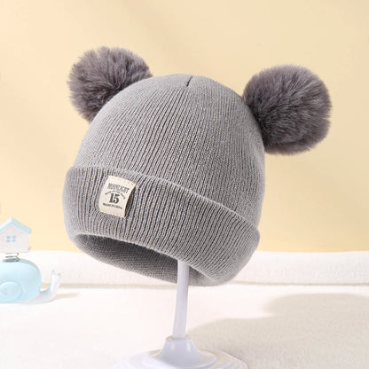 Baby winter hat – knitted beanie with pompom – unisex 