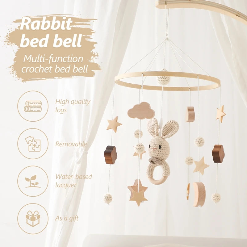 Wooden mobile – with bunnies and playful figures – for a crib or dresser