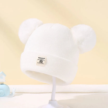 Baby winter hat – knitted beanie with pompom – unisex 