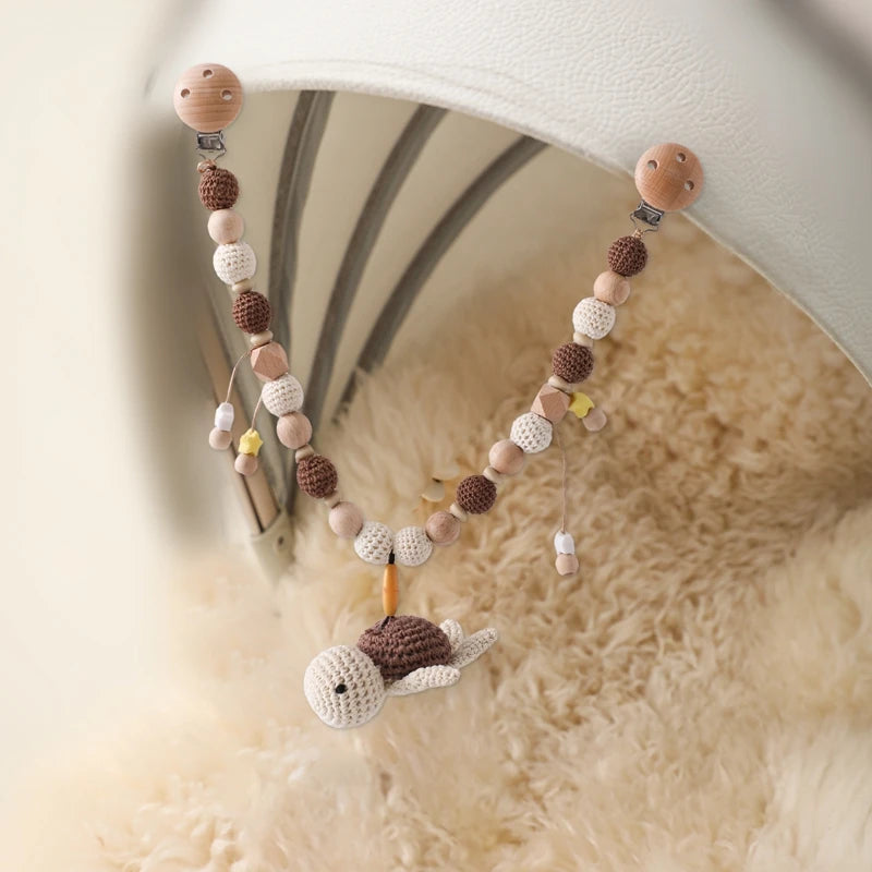 Wooden baby gym or stroller hanger – crocheted animals &amp; beads